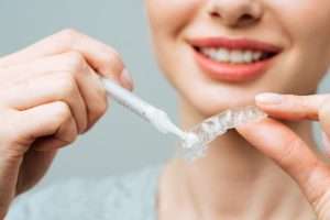 Can You Use a Take-Home Whitening Kit on Crowns or Veneers?